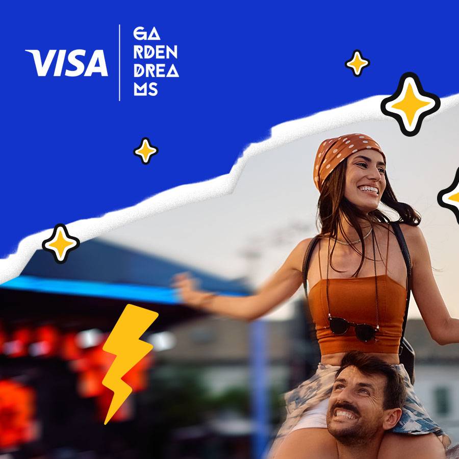 Smiling woman on a man's shoulders at an outdoor event, with a joyful, energetic vibe. Blue background with "VISA Garden Dreams" text, decorated with star and lightning graphics.